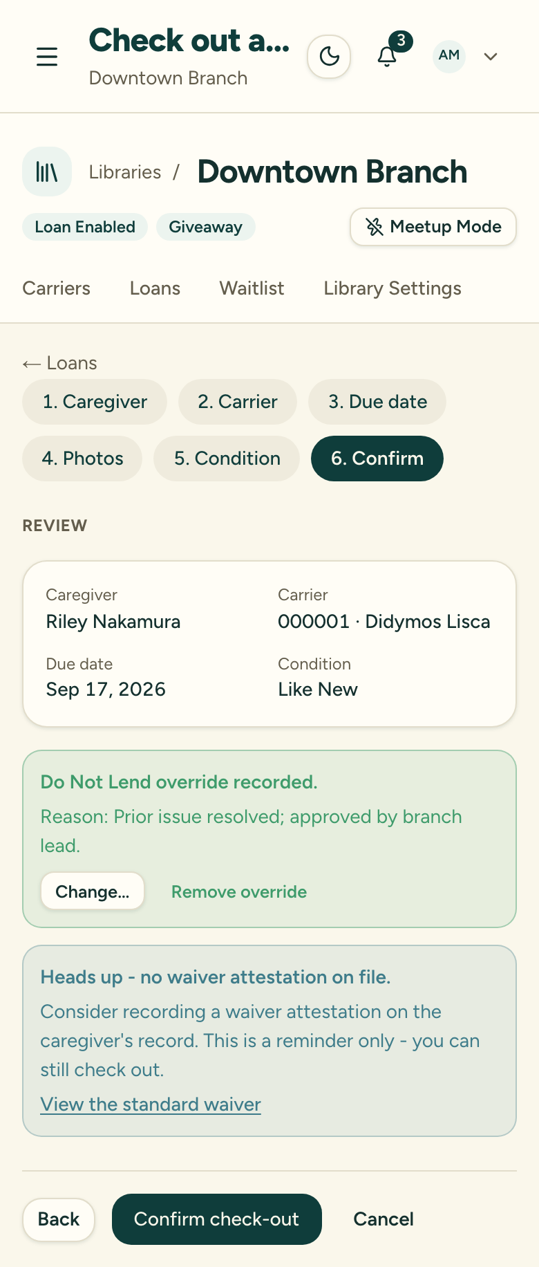 The check-out review step after overriding, showing the override-recorded confirmation with the reason